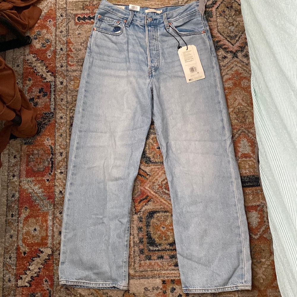 Levi straight high waisted jeans in size 30! Brand new and never worn!